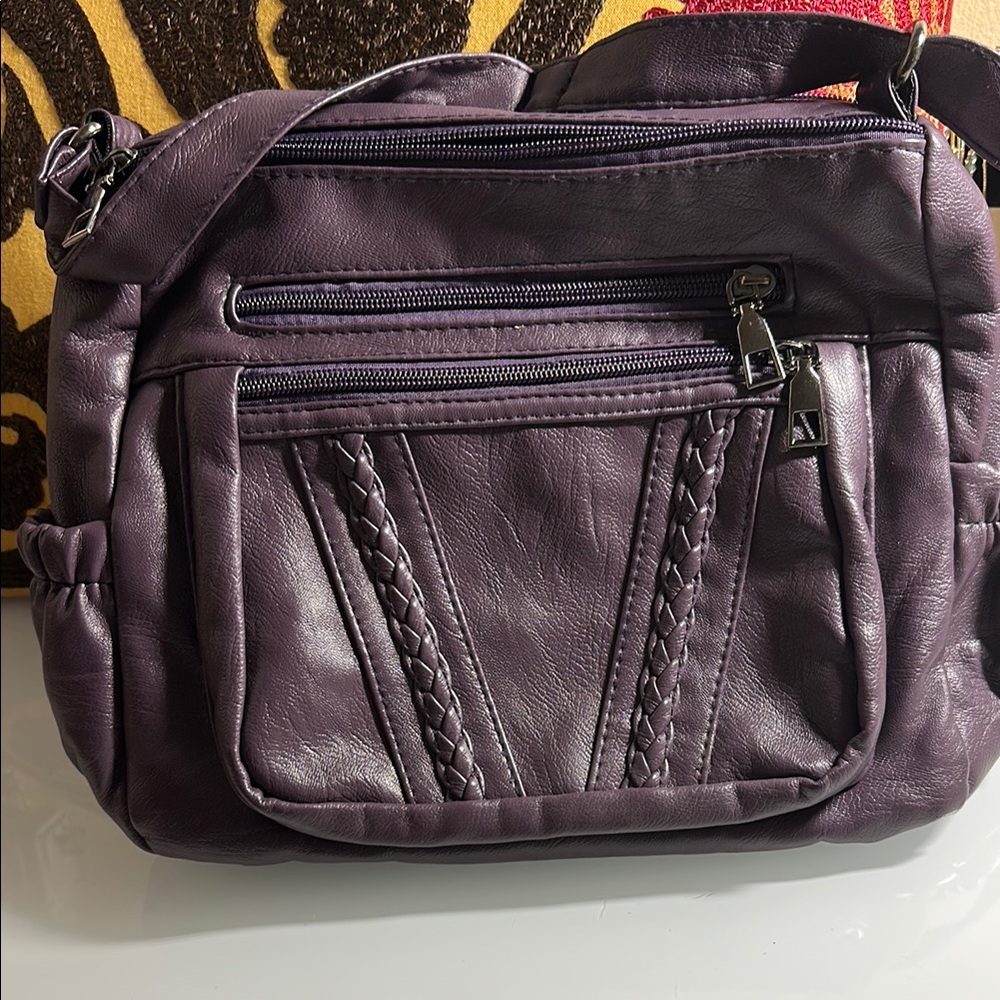 Purple Crossbody Bag with Smooth Finish and Multiple Compartments